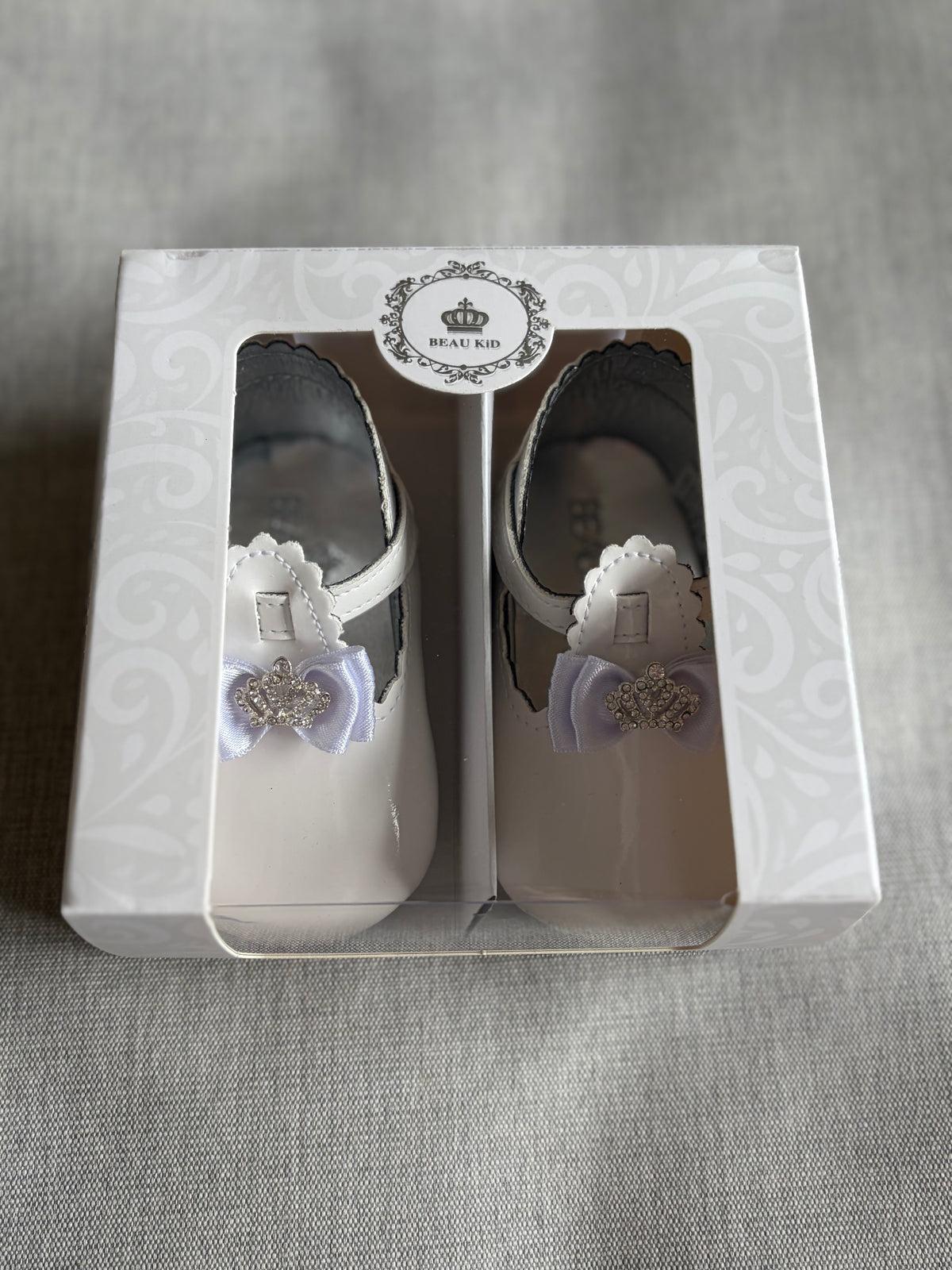 white crown shoes